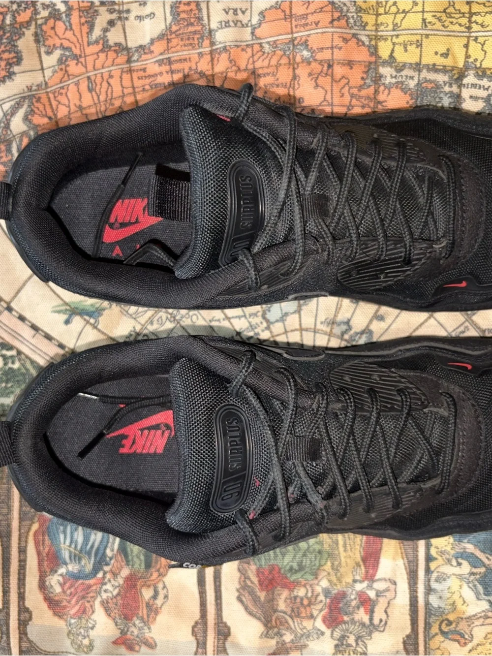 Nike Men’s Black Athletic Sneakers with Red Logo Accent